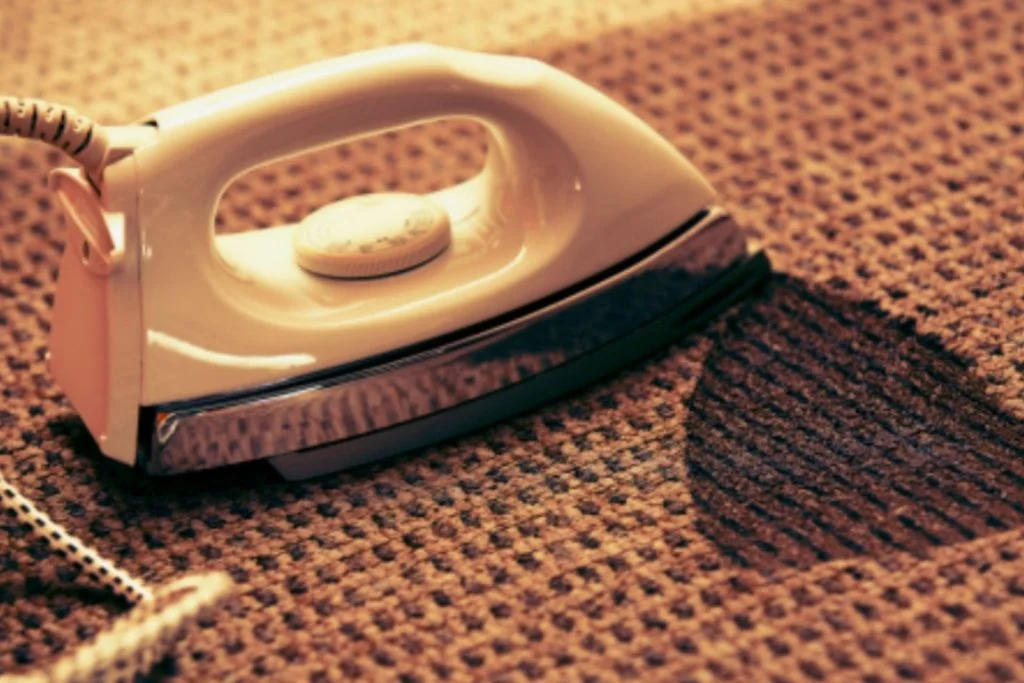 How to get candle wax out of carpet without an iron